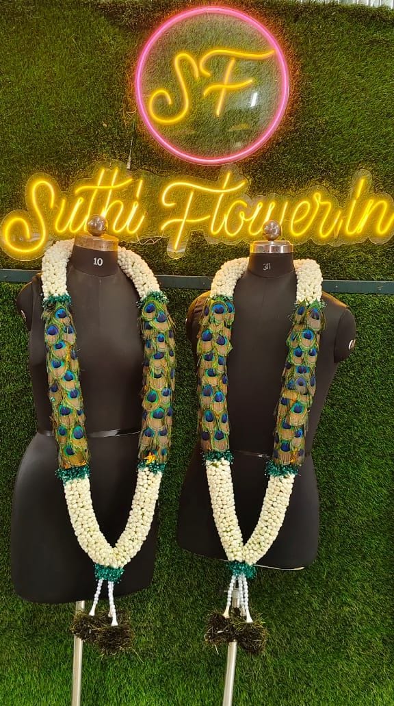 Regal Peacock Feather and Jasmine Wedding Garlands